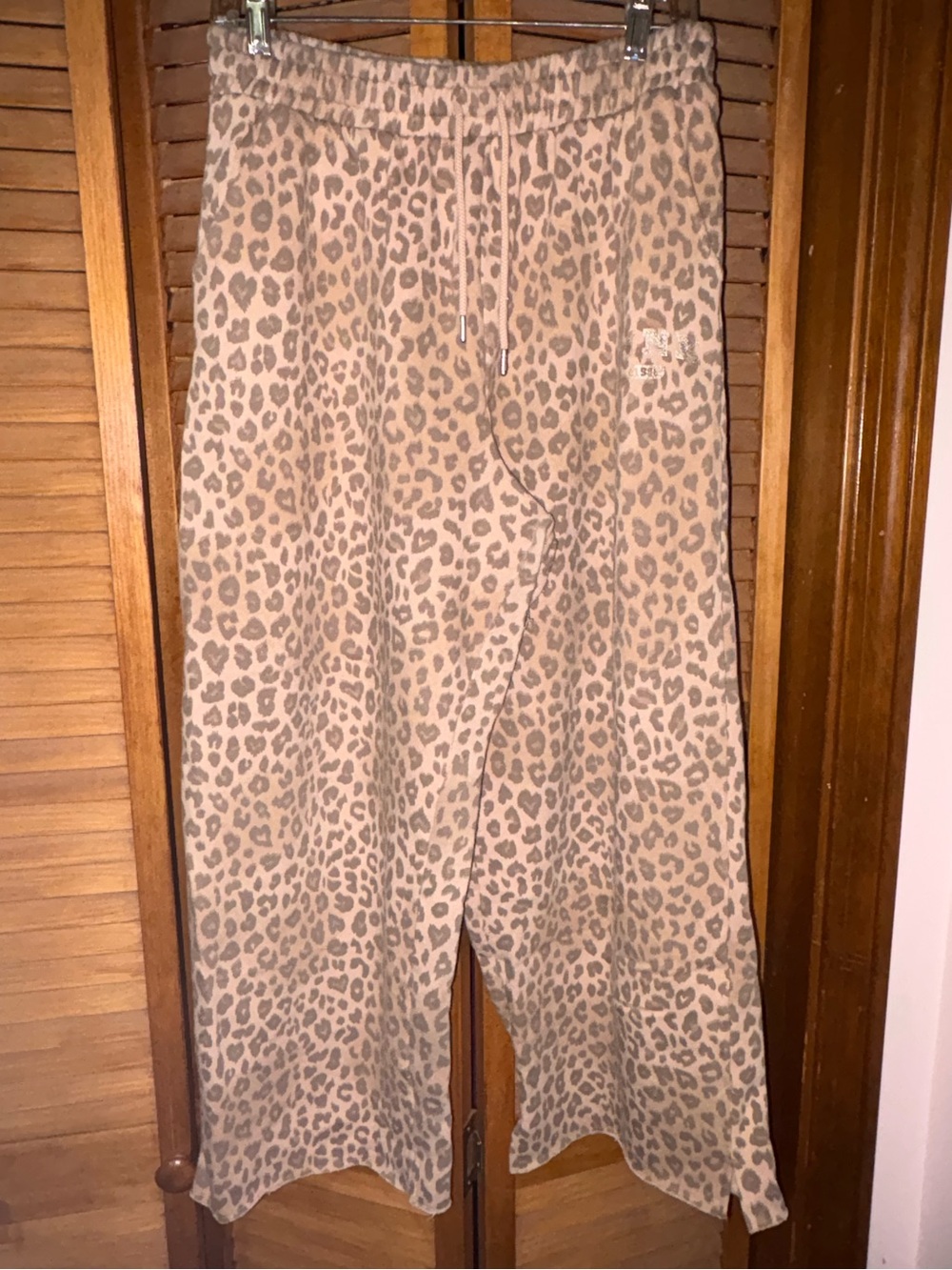 PINK leopard sweatpants.